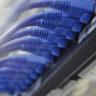 telecommunication-ethernet-cables-connected-internet-switch-data-center-concept_33725-34